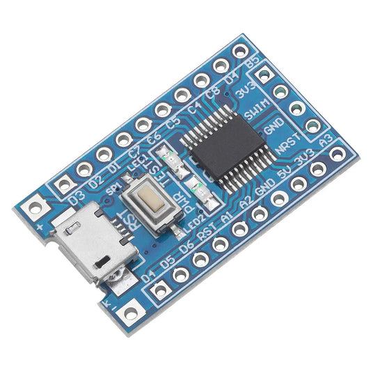 A blue development board with a micro USB port and a reset button, featuring a small IC and LED indicators.