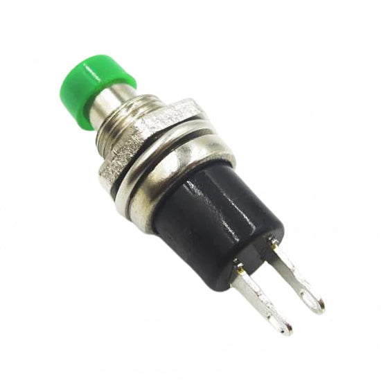 Mechanical switch with green cap on a white background