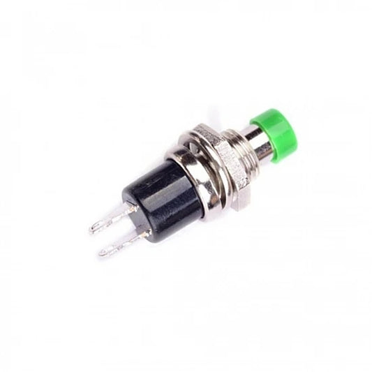 Mechanical switch with green cap on a white background